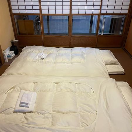 Отель Kiyomizuan 清水庵 車庫2台可 ビフォアアフターの匠 坂田基禎さん改築の京町家 Киото Экстерьер фото